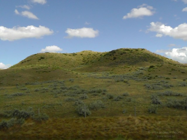 us road trip sage green hills north dakota badlands usa america driving