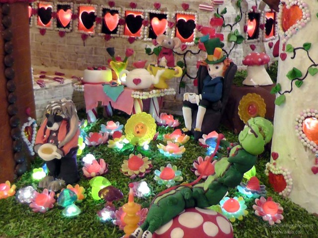 alice wonderland castle gingerbread house village seattle sheraton christmas caterpillar mad hatter