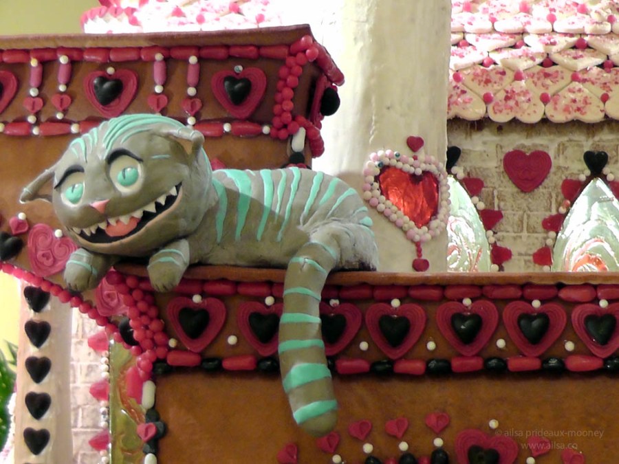 alice wonderland castle gingerbread house village seattle sheraton christmas cheshire cat