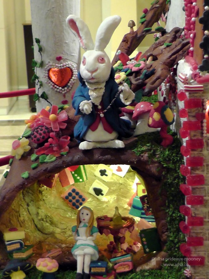 alice wonderland castle gingerbread house village seattle sheraton christmas white rabbit alice rabbithole